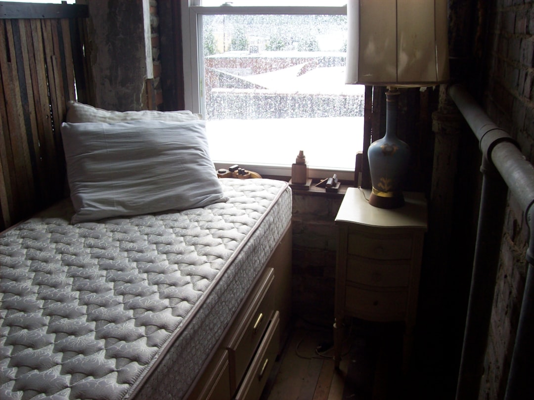 Comfortable mattress in a bright bedroom set up for a July 4th 2026 mattress sale comparison
